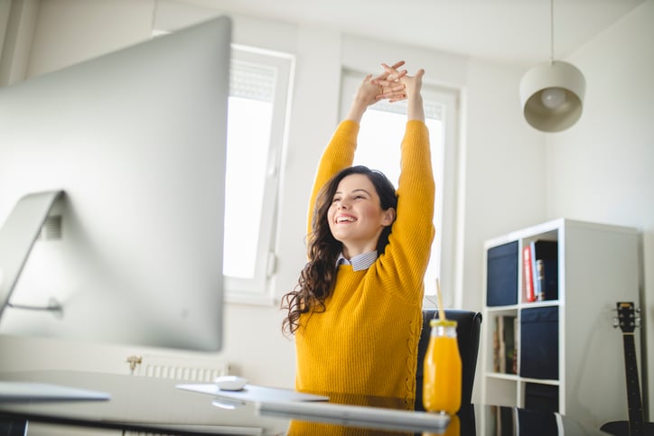 a woman stretching in the office